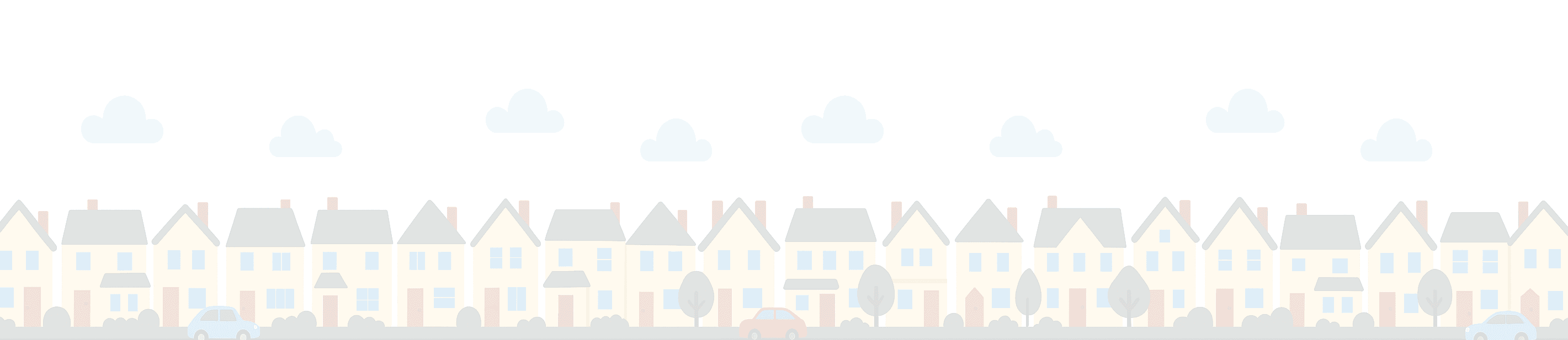 Row of new build houses with cars parked in front